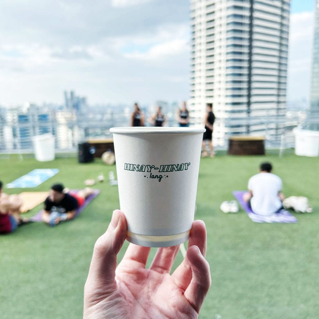 Sulok Coffee hinay-hinay lang cup with Makati skyline